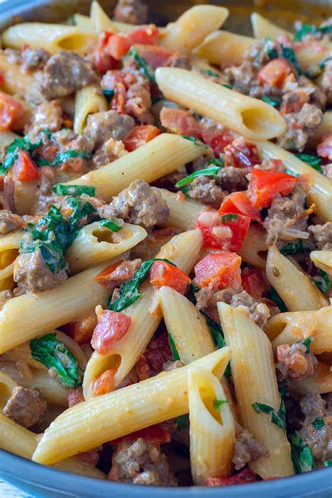 Creamy Italian Sausage and Tomato Pasta | Foodtasia