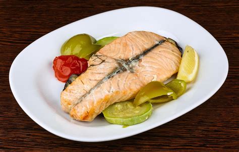 Salmon with grilled vegetables 12272678 Stock Photo at Vecteezy