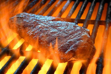 Flame Broiled Steak On A Grill Royalty Free Stock Photography - Image: 30641037