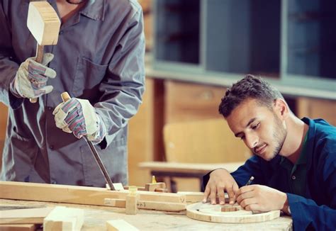 Premium Photo | Workers in industrial wood factory