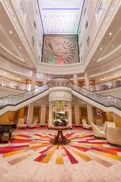 The grand, colourful Atrium on-board Cunard's Queen Mary 2 cruise ship