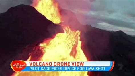 Drone video captures volcano collapse | 7NEWS