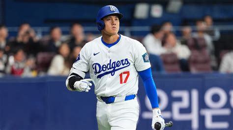 Shohei Ohtani will begin throwing this week, but Dodgers manager shoots down idea of him ...