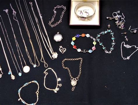 Group lot mainly silver jewellery incl Round locket, bracelet with filigree heart lock, chains ...
