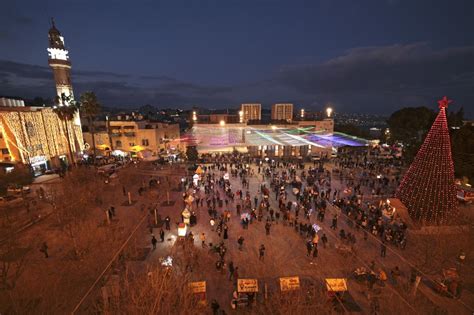 Israelis flood Nazareth for Christmas celebrations, while Bethlehem ...