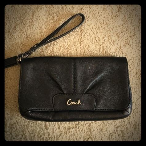 Black Coach Wristlet Black Coach Wristlet with 8 card pockets Coach ...