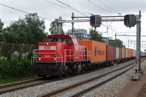 On 20 July 2016 a container train with 6428 passes Zwijndrecht. - Rail-pictures.com