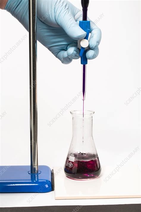 Titration of potassium manganate (VII) - Stock Image - C030/3774 - Science Photo Library