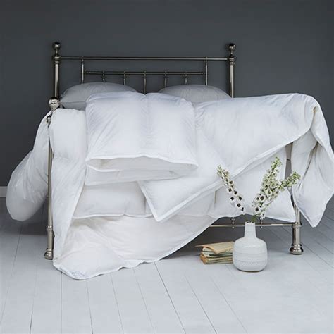 Difference Between Feather and Down Bedding | Feather & Black