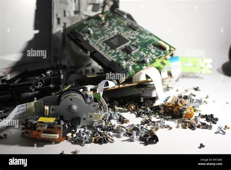 A pile of broken technology parts Stock Photo - Alamy