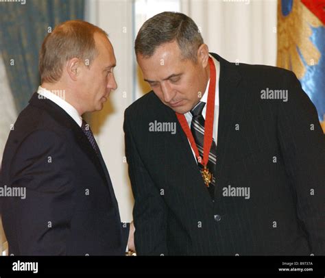 Russian President Vladimir Putin left awards the Order of Merit 3 rd ...