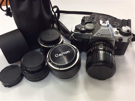 Lot 855 - Canon AE-1 camera and lenses