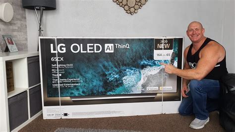 2020 65” LG CX OLED unboxing,wall mounting & demo ! - YouTube