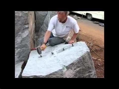 Splitting stone with feather and wedge. | Stone carving, Practice space, Stone