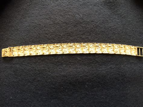 14 Karat yellow gold paneled Bracelet - Amherst Antiques