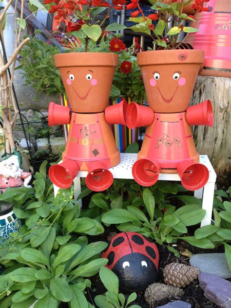 20 Amazing Garden Ideas For Stacked Pots | Flower pots, Flower pot people, Clay pot crafts