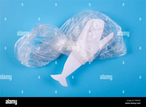 ocean plastic pollution issue. sea animals in plastic bag Stock Photo - Alamy