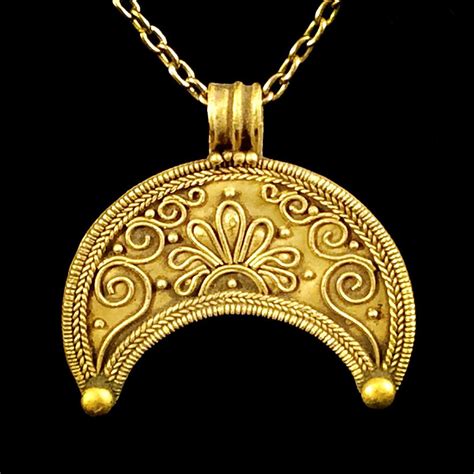 Greek Hellenistic Lunar gold pendant form of a wide moon crescent with granules the crescent ...