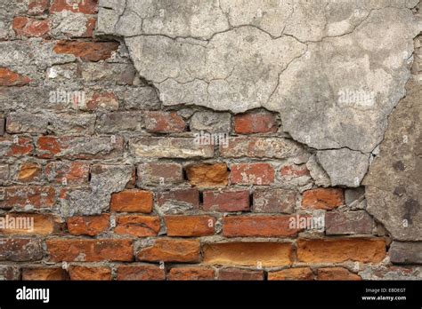 Texture of old brick wall with chipped plaster Stock Photo - Alamy