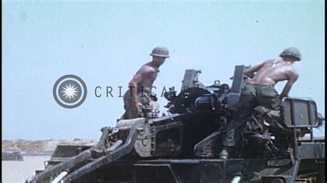 US Army soldiers load, aim and fires from M110 Howitzer in Long Binh ...