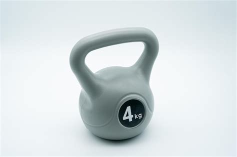 Premium Photo | Home gym concept with kettlebells and dumbbells