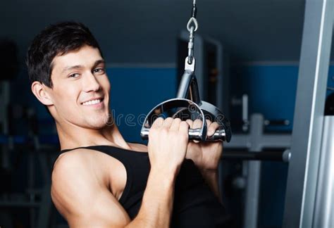 Athletic Man Works Out on Gym Training Stock Image - Image of ...