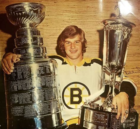 Bobby Orr with The Stanley Cup and Prince of Wales Trophy 1972 | HockeyGods