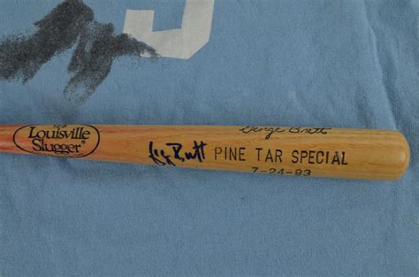 Lot Detail - George Brett Autographed Pine Tar Mini Bat & Jersey