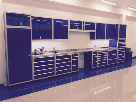 Moduline Blue Aluminum cabinets with plenty of tool storage. | Garage interior, Aluminum garage ...