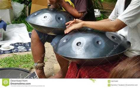 Handpan Drum Playing Beautiful Song in the Park Stock Photo - Image of entertain, drum: 58279482