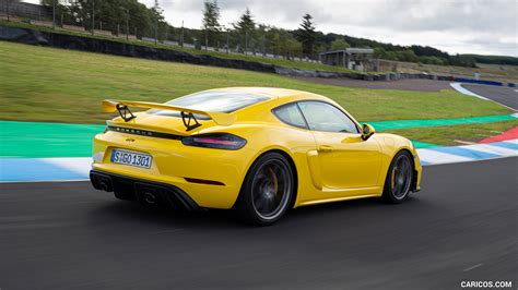 2020 Porsche 718 Cayman GT4 (Color: Racing Yellow) - Rear Three-Quarter ...