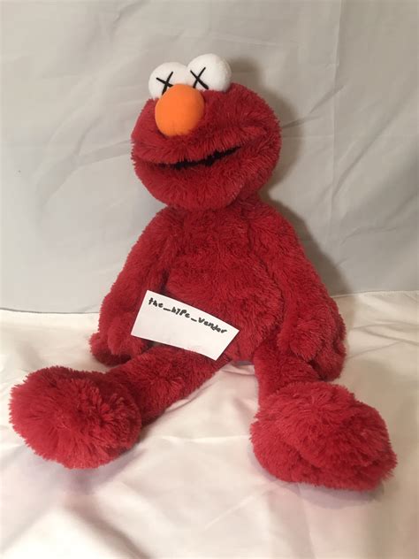 Uniqlo Kaws Elmo plush | Grailed