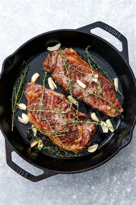 How to Cook Reverse-Sear Steaks: start in the oven, finish in a hot cast-iron skillet. Cast Iron ...