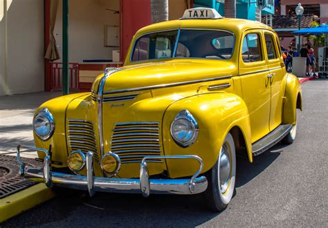 Yellow Vintage Taxi in Orlando, Florida jigsaw puzzle in Cars & Bikes puzzles on ...