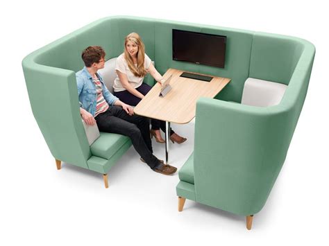 Entente by Lyndon is a sofa and table hybrid workspace with a distinctive, elegant look ...