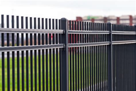 Black iron fence stock image. Image of construction - 205851687