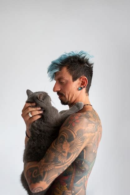 Man With Cat Tattoos Images - Free Download on Freepik