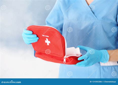 Doctor in Medical Gloves with First Aid Kit Stock Photo - Image of ...