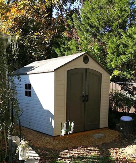 Lifetime 6405 Outdoor Storage Shed with Window, Skylights, and Shelving