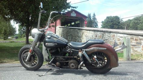 Harley Davidson FLH Shovelhead Rat Bike in Front of a Covered Bridge