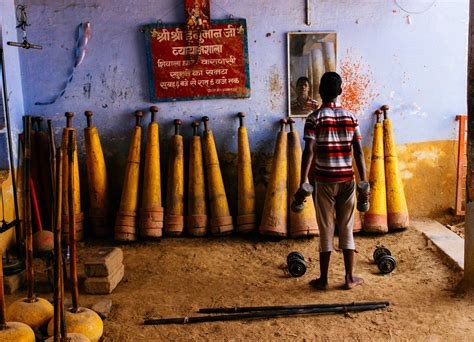 A boy working out in a Kushti wrestling akhara (gym), Varanasi, India ...