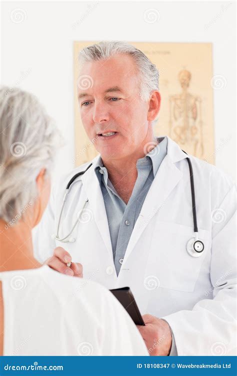 Senior Doctor Talking With His Sick Patient Royalty Free Stock Photography - Image: 18108347