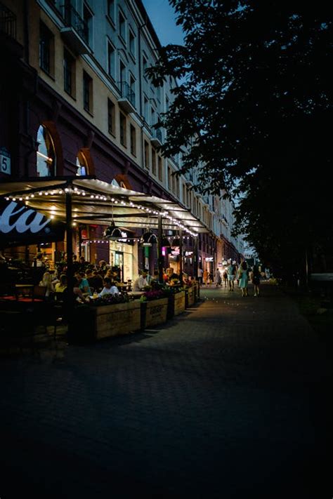 Restaurant Garden on the Walkway in the Evening · Free Stock Photo