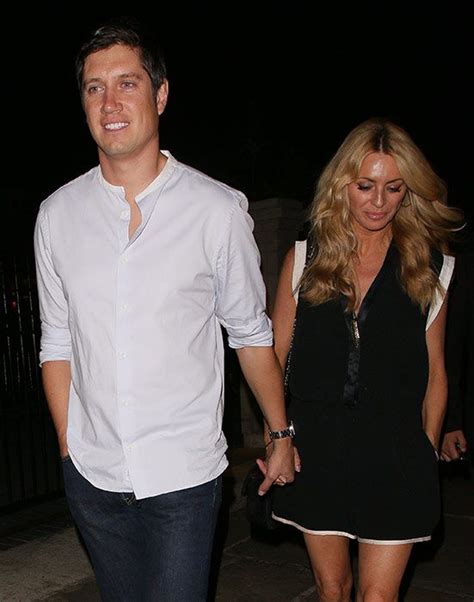 Tess Daly and Vernon Kay hold hands on night out following Rhian Sugden texting rumours