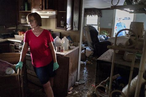 Survivors grapple with aftermath of deadly Tennessee flood | AP News