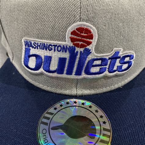 Washington Bullets 1978 Throwback Logo Heather Gray / Blue Snapback Hat ...