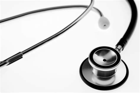 Stethoscope Bell On White Stock Photo - Download Image Now - iStock