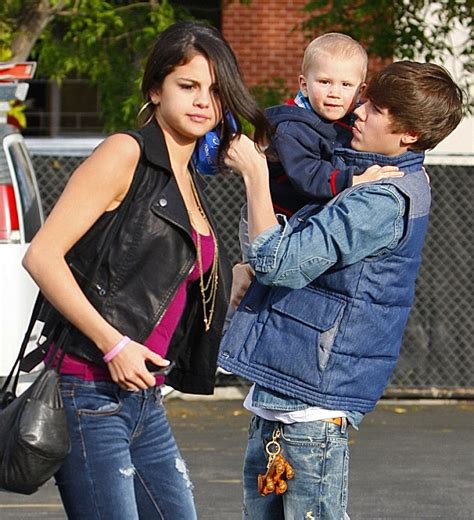 Entertainment: Justin Bieber and Selena Gomez look exhausted as they babysit for a second day in ...