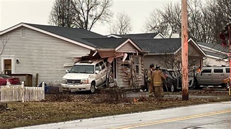 3 people, including child, hospitalized after car crashes into southwest Columbus house