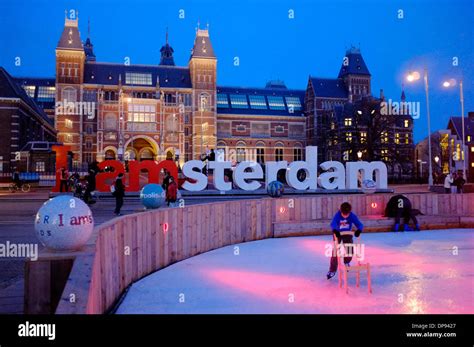 The rijk museum with ice skating rink and I AMSTERDAM SCUPLTURE Stock Photo - Alamy